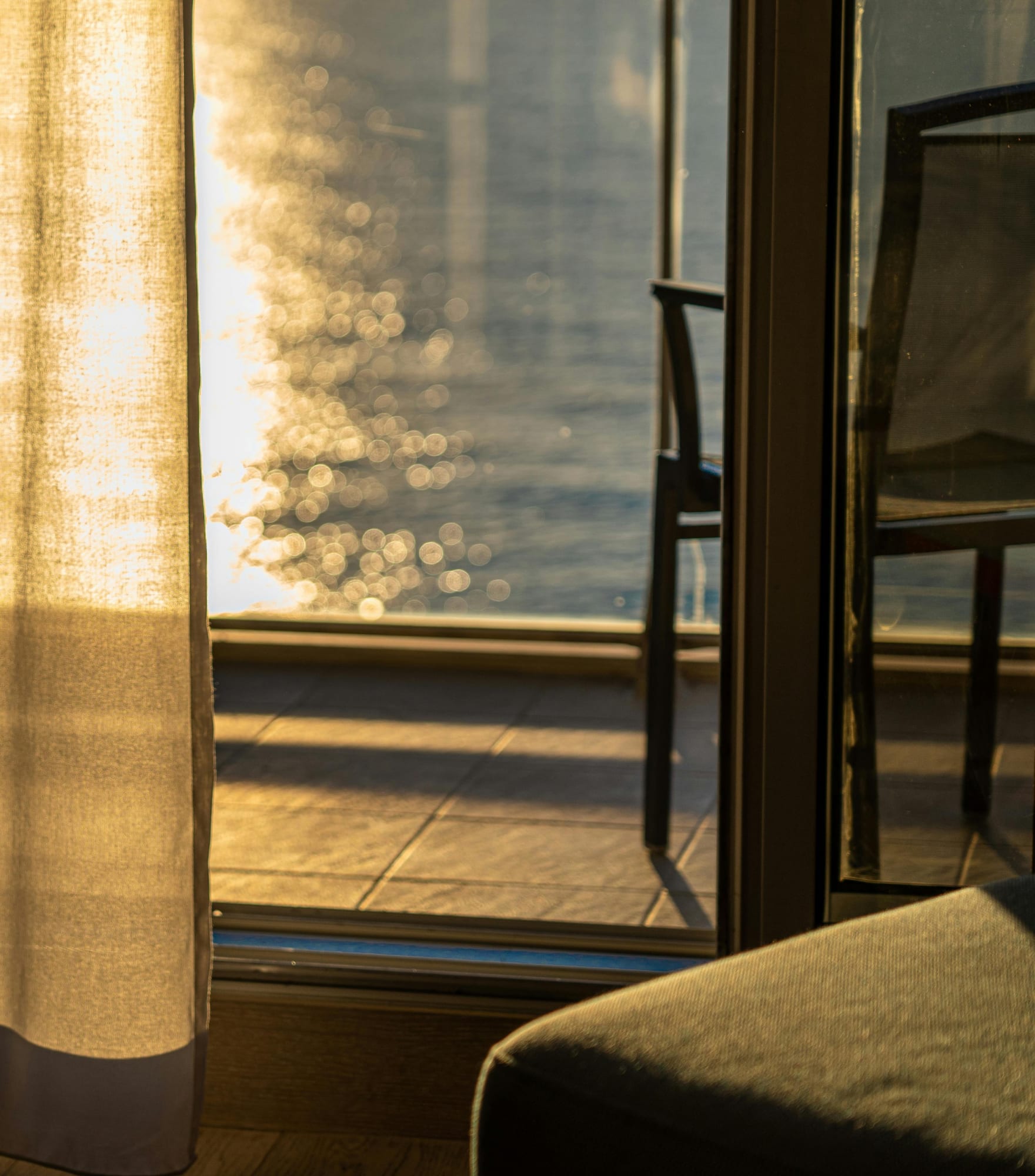 Sunlight through a curtained window